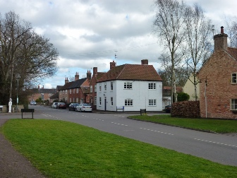 Near the centre of Orston village.